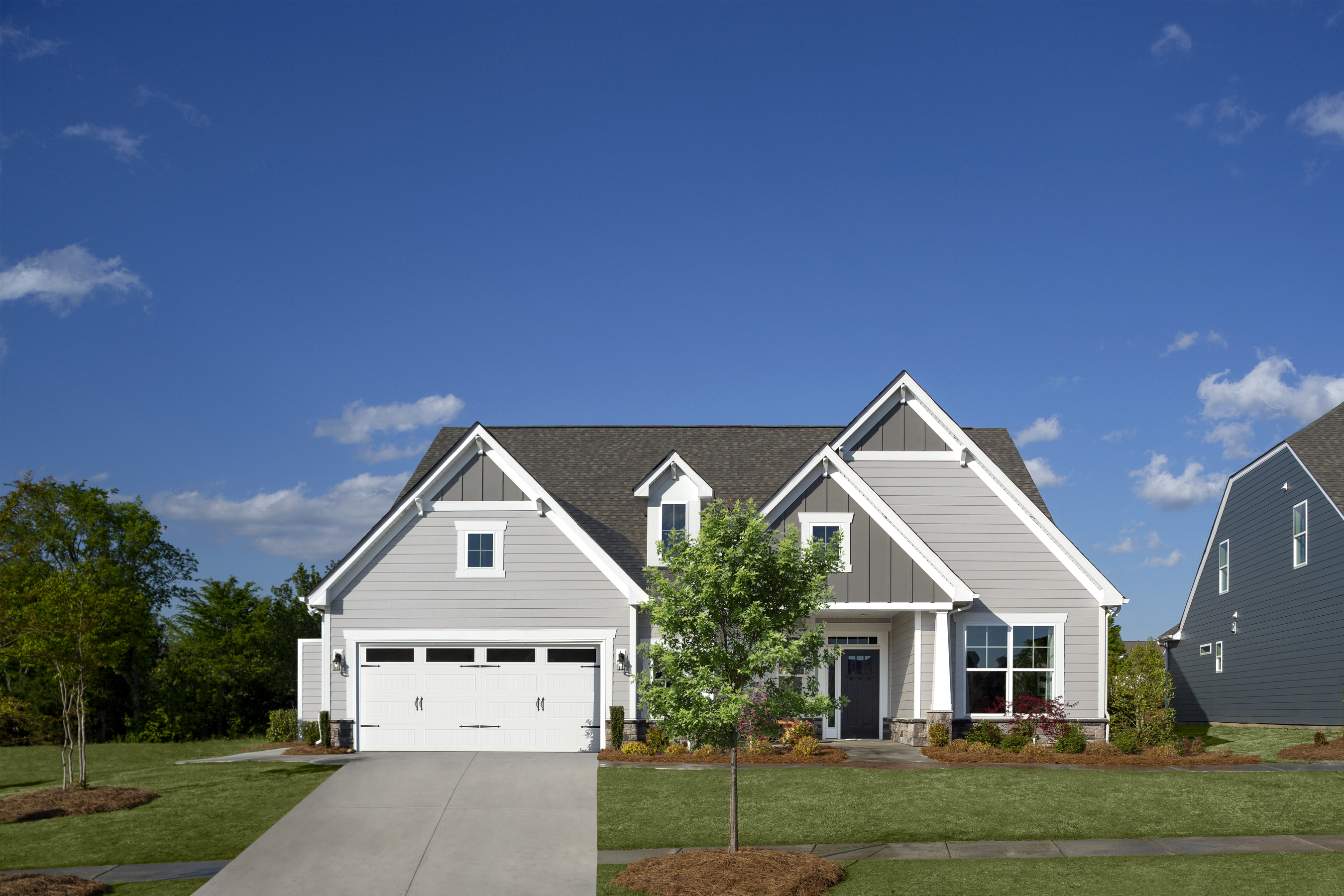 ranch style home with blue sky